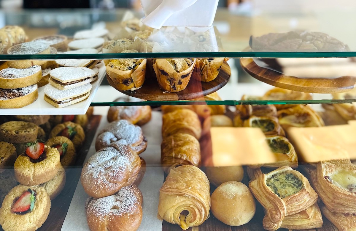 Glass cases filled with croissants and other pastries at Lubella's Patisserie. | Photo by Lubella's Patisserie