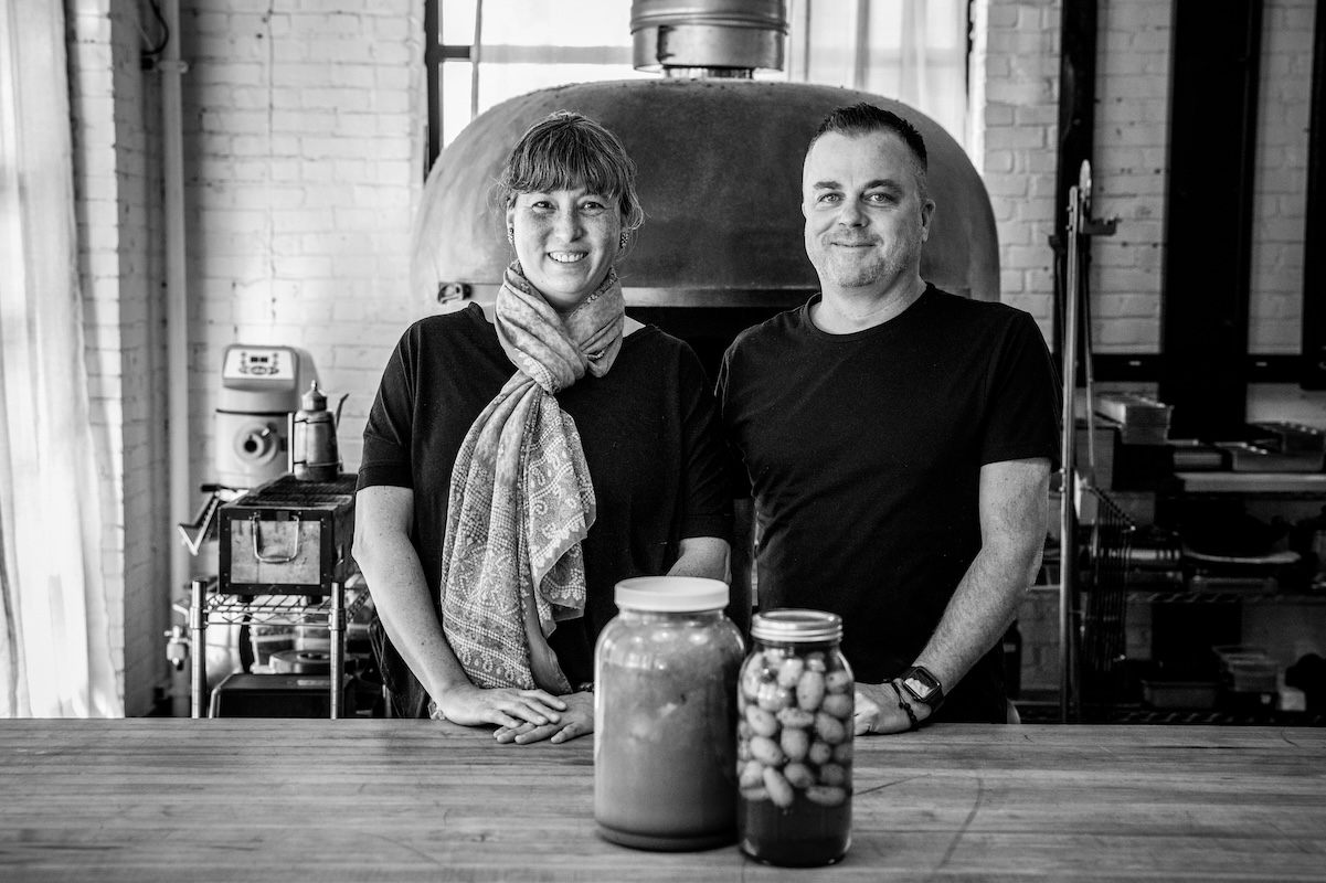 Mara King (left) and Kelly Whitaker (right) with a jar of pickled eggs at Basta in Boulder. | Photo courtesy of id est hospitality