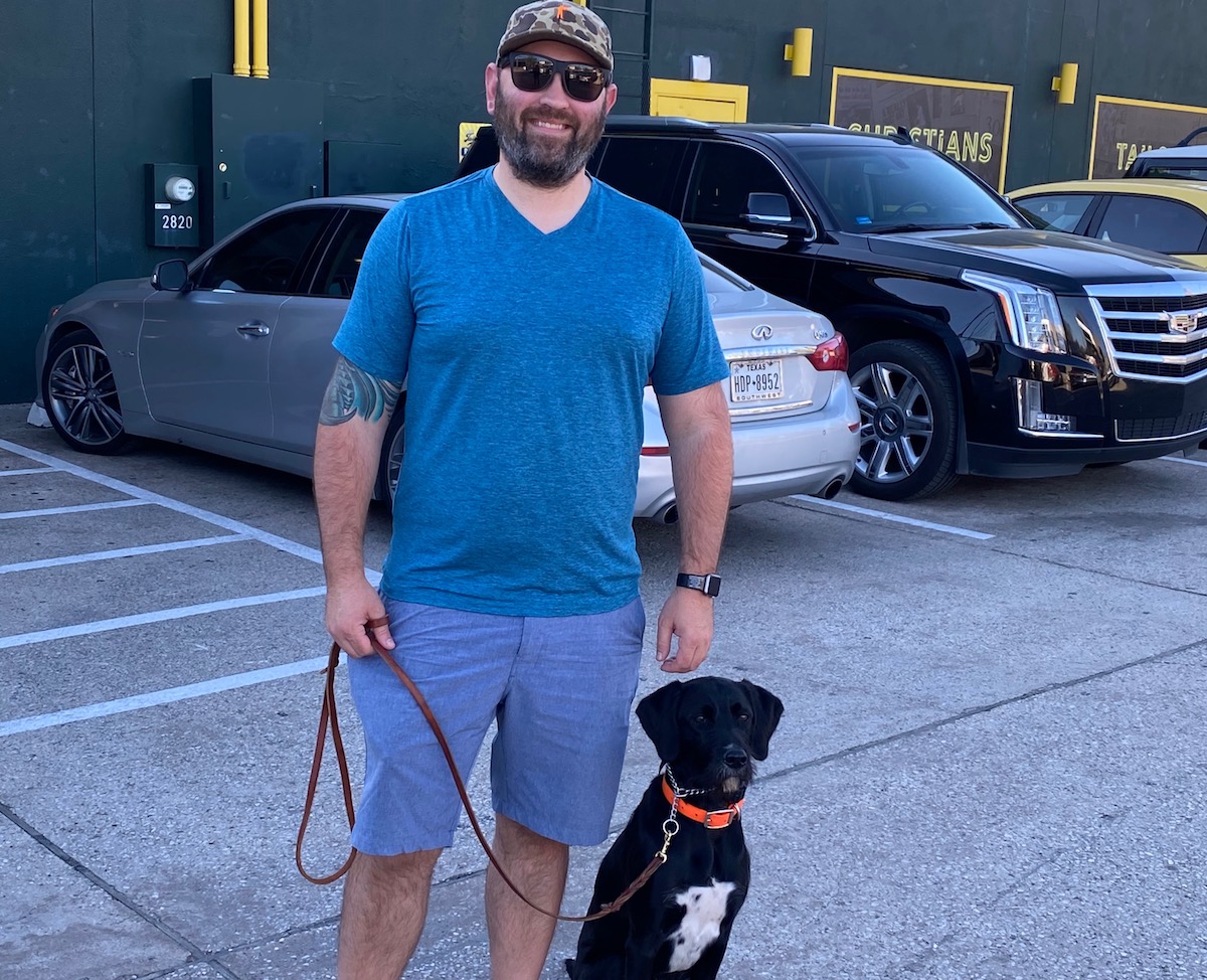 Matt Tanner, co-owner and operator of EZ's Liquor Lounge with his dog Greta. | Photo courtesy of Matt Tanner