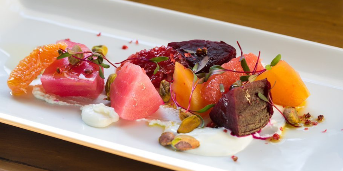 Menu-Makers-Farow - DiningOut Farow is based on the philosophy of sourcing around 90% of our ingredients within 10 miles of the restaurant. We believe local seasonal food tastes better and supporting local is the best way forward. Citrus season hits at just the right time of year. With winter being cold and dark, and most seasonal produce being root-vegetable oriented, the brightness of citrus is an extremely welcome contrast to any dish. Here, it adds a welcome pop of color and sweetness to tangy, earth-pickled beets and creamy goat cheese. Farow will be serving up this colorful and taste-filled salad during their Valentine’s Day dinner, and now you can recreate with love in your home.