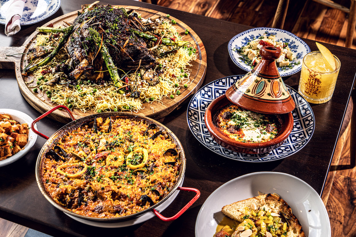 Paella and other dishes at Mi Luna. | Photo by Dylan McEwan