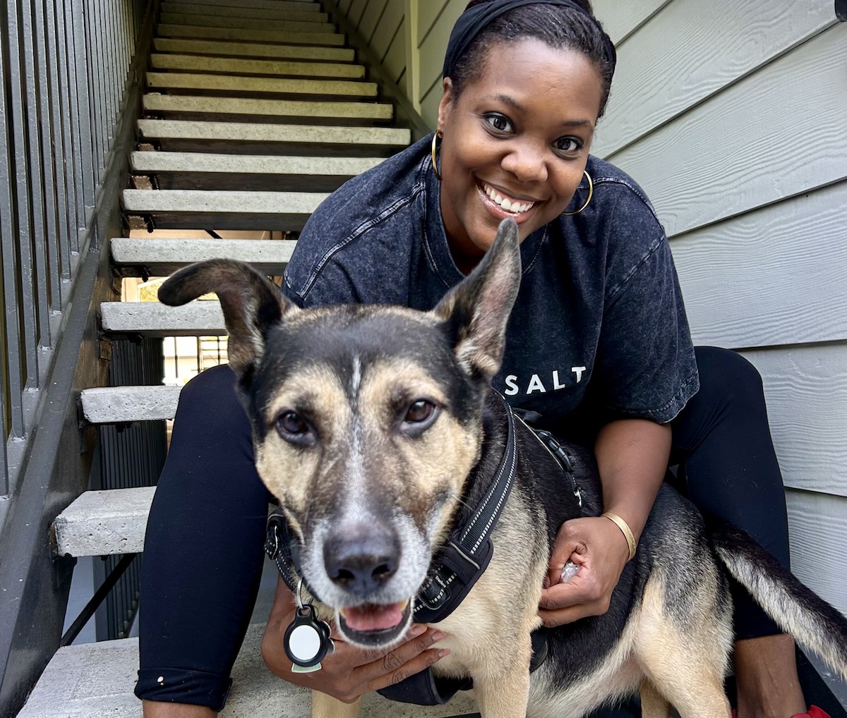 Michell Wallace, chef and owner of B'tween Sandwich Co. with her dog Rocco. | Photo courtesy of Michelle Wallace