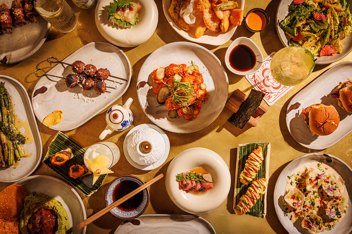 A tablescape at Norman's showcasing a variety of hot and cold dishes. | Photo by Samantha Marie Photography