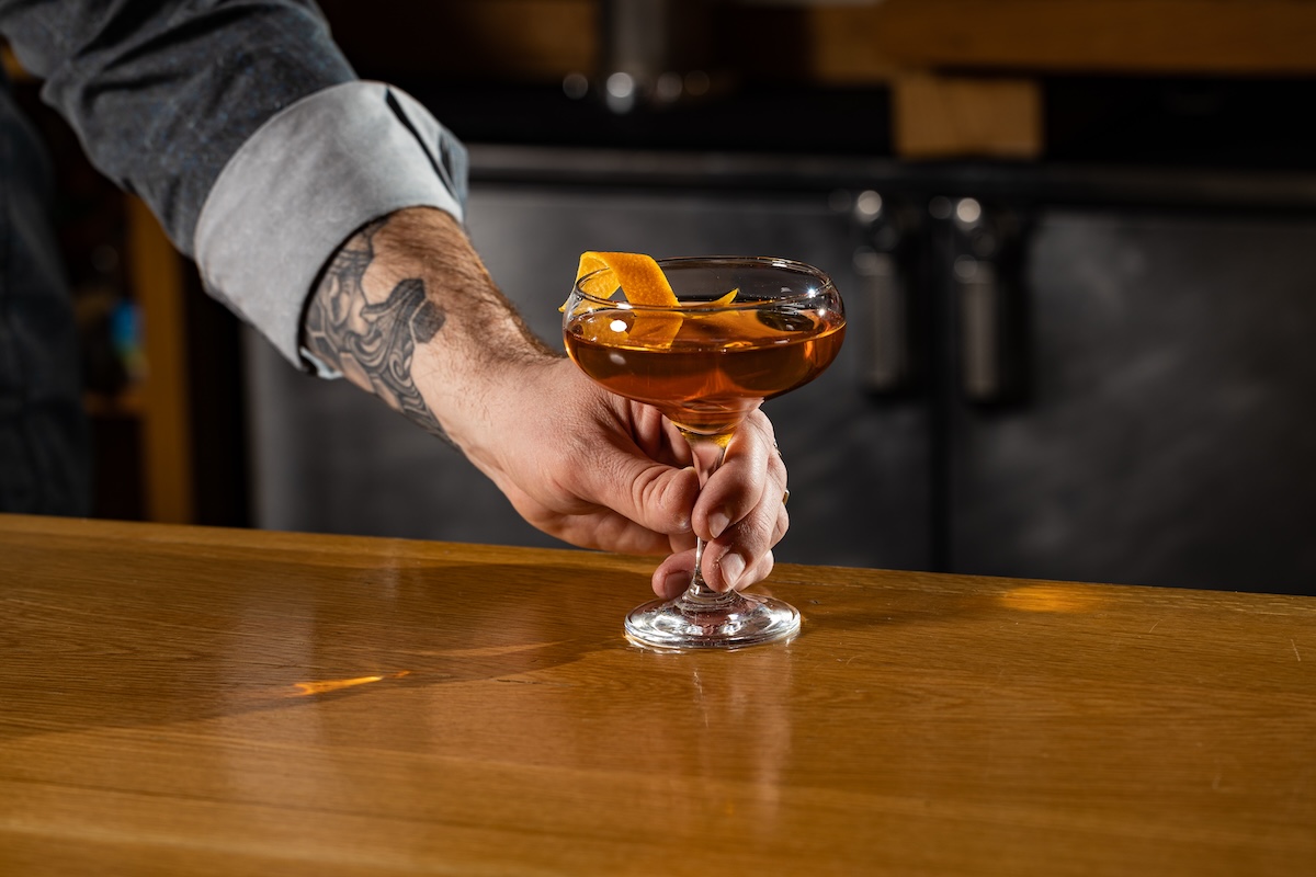 hand holding cocktail