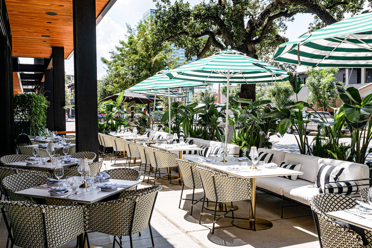 The lush patio at Okto. | Photo by Kirsten Gilliam