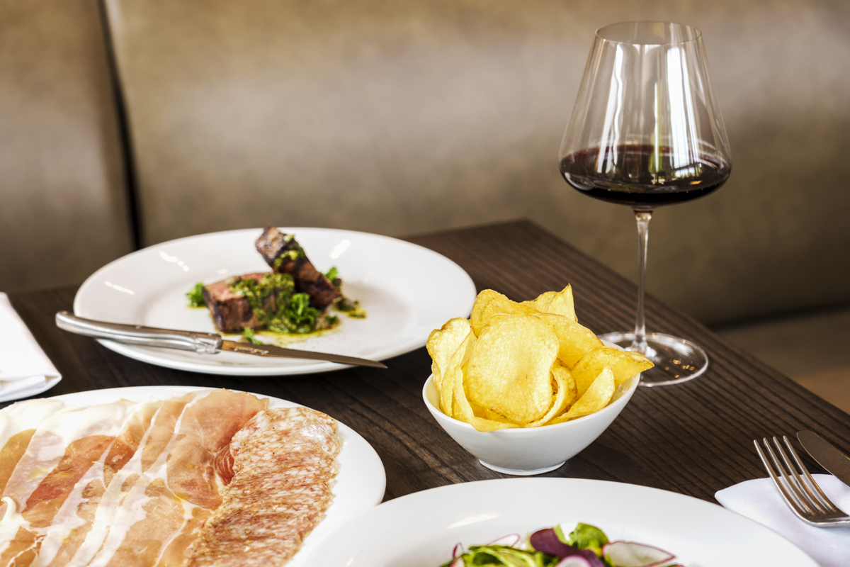 Book a laid back NYE meal at Osteria Alberico. | Photo by Ashely Beguin