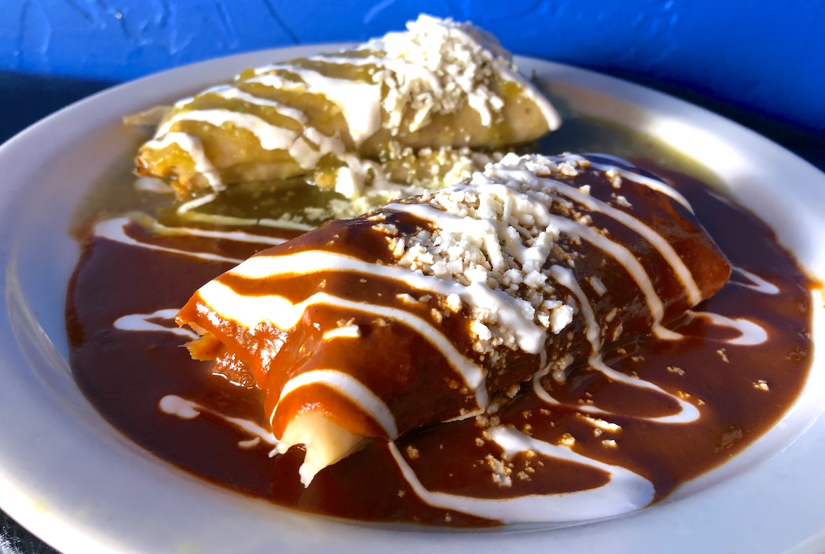 - DiningOut Global Smothered Mexican delights at Palenque. | Photo by Tony White