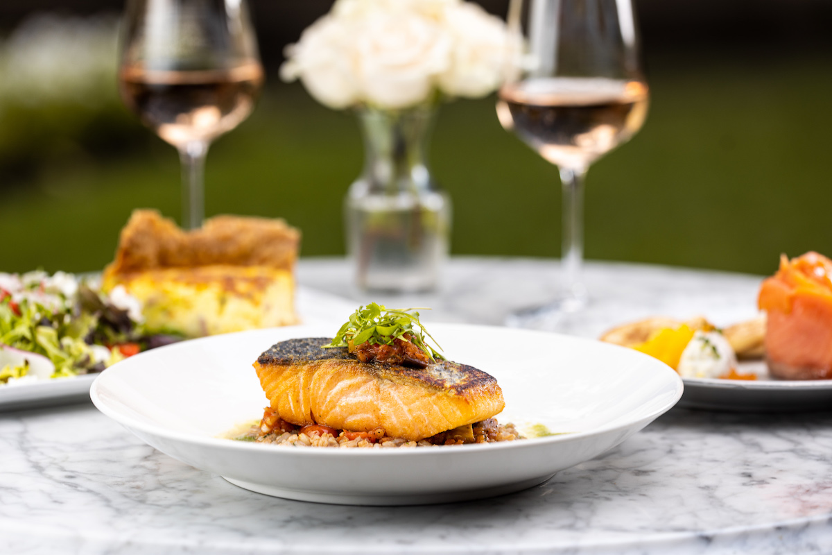 Pan-roasted salmon at Mercat Bistro. | Photo by Harwood Hospitality Group