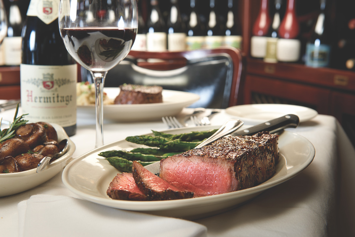 - DiningOut Steak, asparagus, and mushrooms at Pappas Bros. Steakhouse. | Photo by Julie Soefer