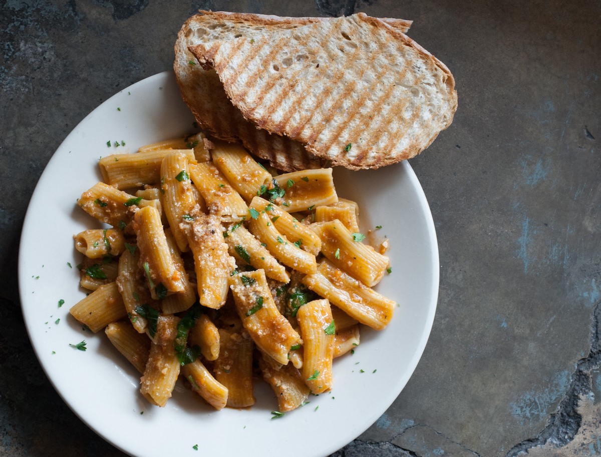 Rigatoni Bolognese is one of the many pastas, salads and entrees available in smaller portions at Paulie’s. | Photo by Debora Smail