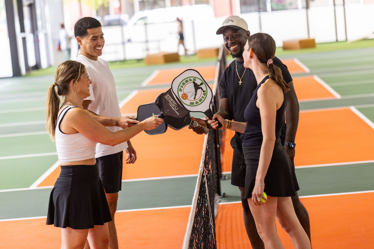 - DiningOut A pickleball matchup at Pickle Mania. | Photo by Andrew Hemingway
