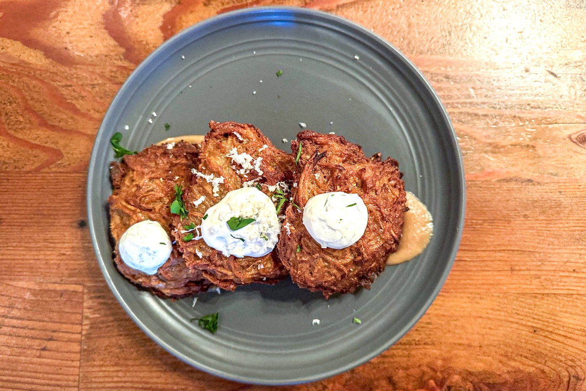 - DiningOut Potato pancakes at Bronwyn. | Photo by Suzanne Podhaizer