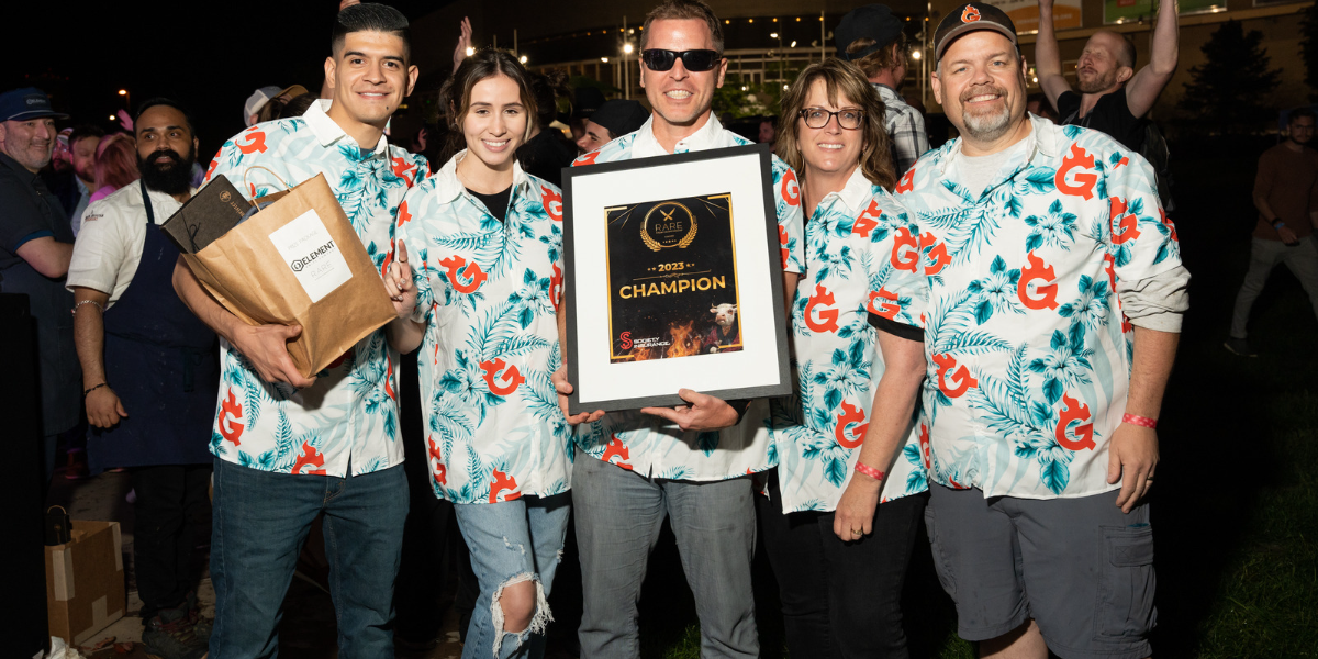 Like a well-aged steak, RARE, The Denver Steak Championship seared its way into the hearts of Denver food lovers on May 25, despite a taste of Mother Nature’s dramatic seasoning. Hosted in the prestigious Sculpture Park at Denver Center for the Performing Arts and produced by DiningOut Events, the culinary contest began with a dash of hail, a sprinkle of thunderstorm warnings, and a generous pouring of suspense.