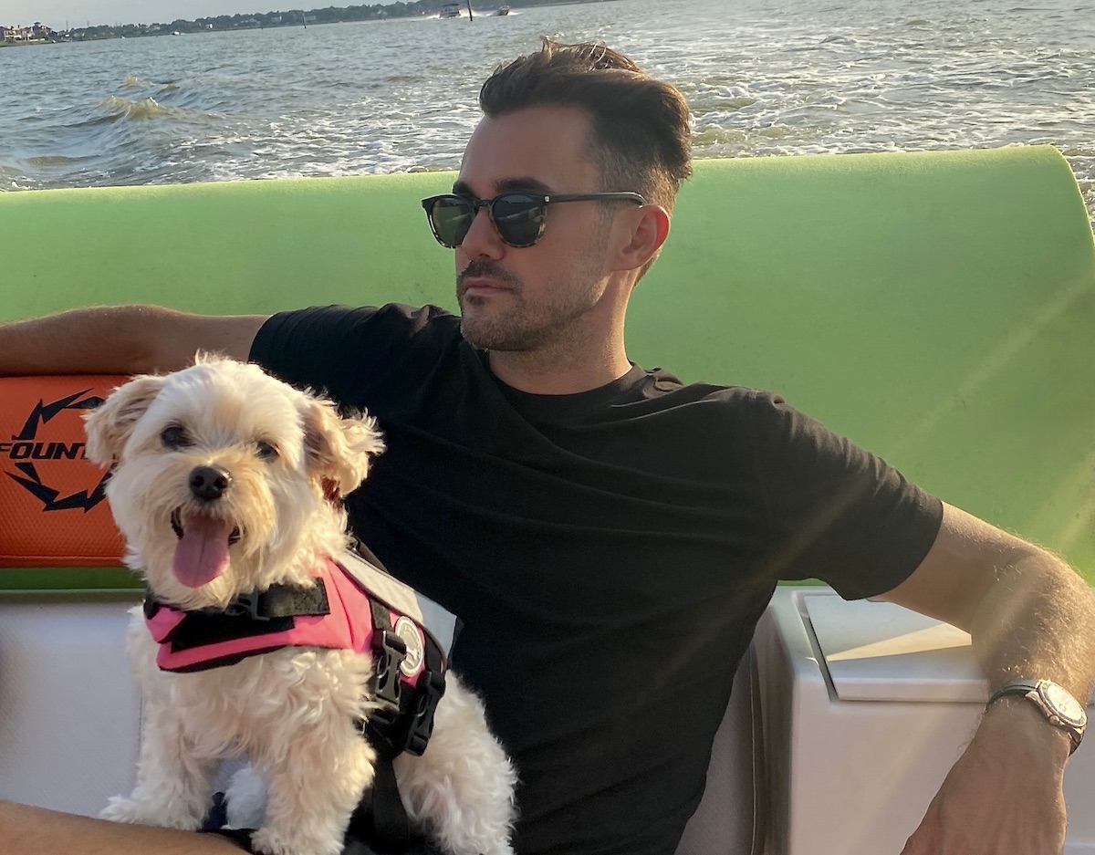 Raz Halili of Pier 6 Seafood & Oyster House in San Leon and Fish Company Taco in Galveston with his dog, Zoe. | Photo courtesy of Raz Halili