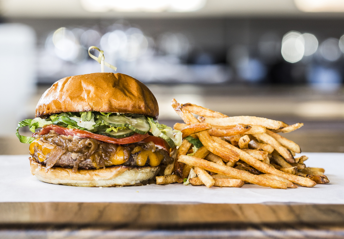 Potato-pancakes-at-Bronwyn - DiningOut The classic burger at Relish, made with house-ground beef, cheddar, caramelized onions, aioli, pickles, lettuce, tomato, and served with hand-cut fries. | Photo by Julie Soefer