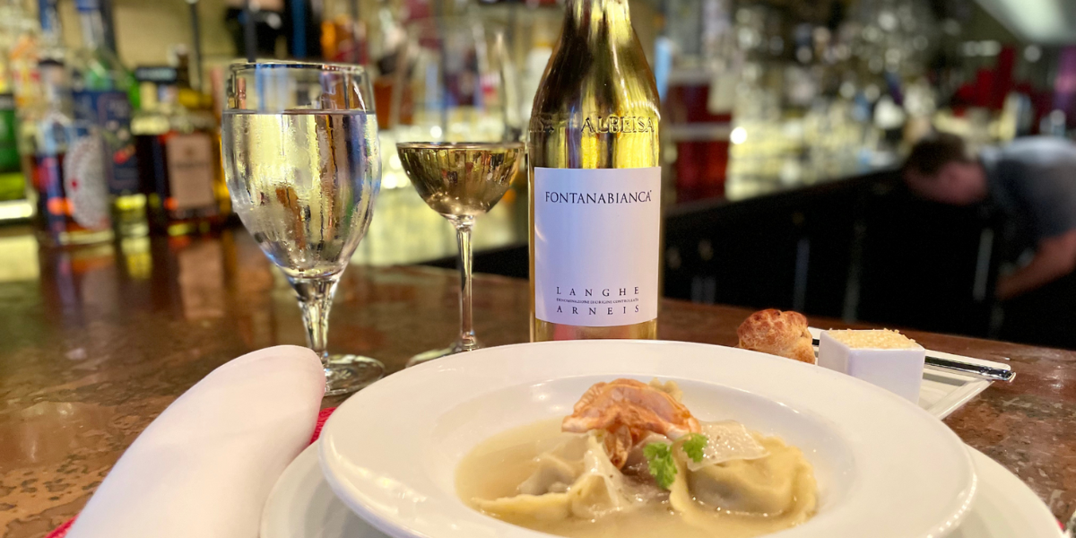 The spectrum of gold and yellow during Fall in Colorado is tough to capture. Mother Nature paints a beautiful picture of the season with this gold-flecked wine from the Arneis grape. Like the previous wine, this beautiful bottle is crafted in the hills of Italy’s Piedmont region, and it’s no mistake. There’s something about the wines from this area, whether red or white, that’s so spectacular this time of year. The Fontatabianca winery in the Neive region of Piedmont has been responsible for top-tier examples of grapes like Arneis and Nebbiolo for decades. Their refined winemaking practice is apparent in their seamless delivery of elegant classics vintage after vintage. Arneis is a variety you may not be familiar with, but it's worth a try if you love crisp, refreshing whites. Served alongside the iconic Artichoke Tortelloni with truffle brodo, aged Manchego, and chervil at Rioja on Larimer Square, this is a combination of flavor and texture that’s perfection whether you’re looking for a date night win or a quick plate after work as the breeze brings the leaves off the trees in downtown Denver.