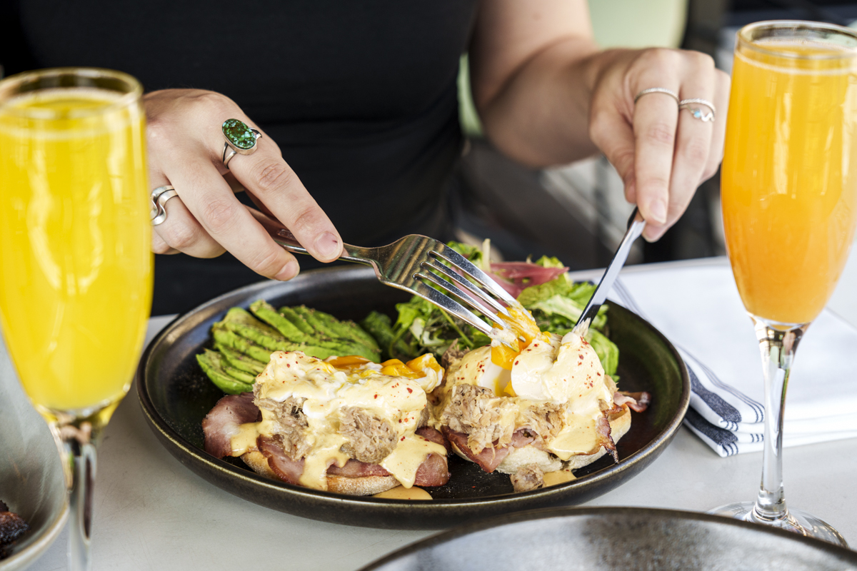 - DiningOut Global Rood Down makes a mean eggs Benedict. | Photo by Ashley Beguin