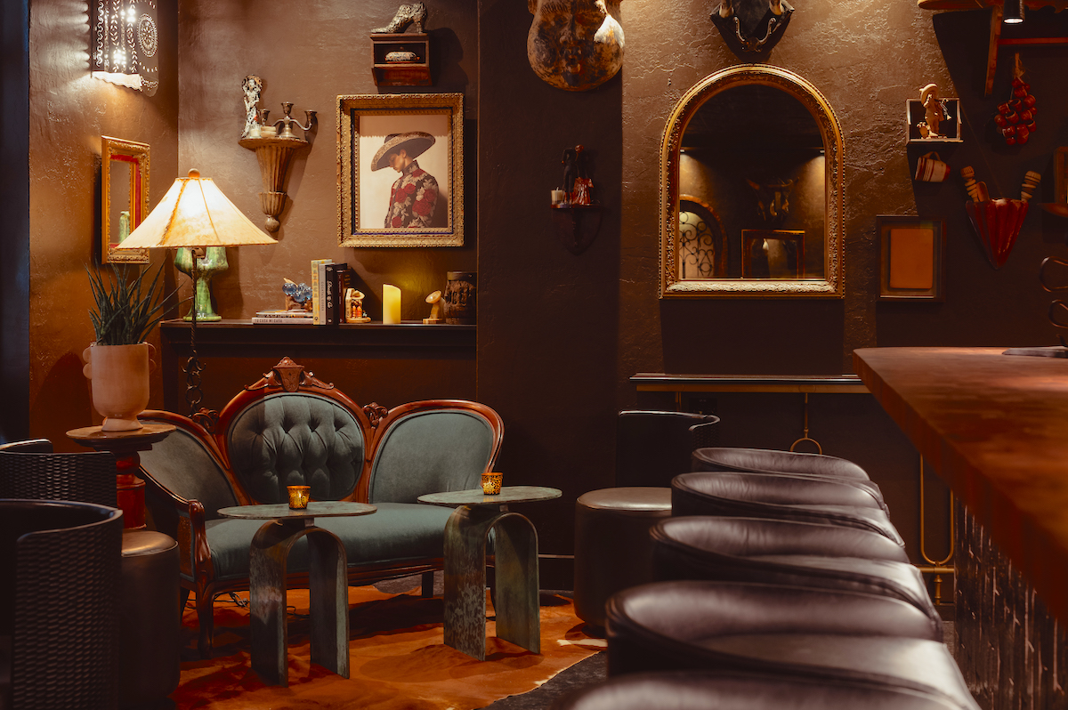 The dimly-lit interior of Bar Buena. | Photo by Goode Co.