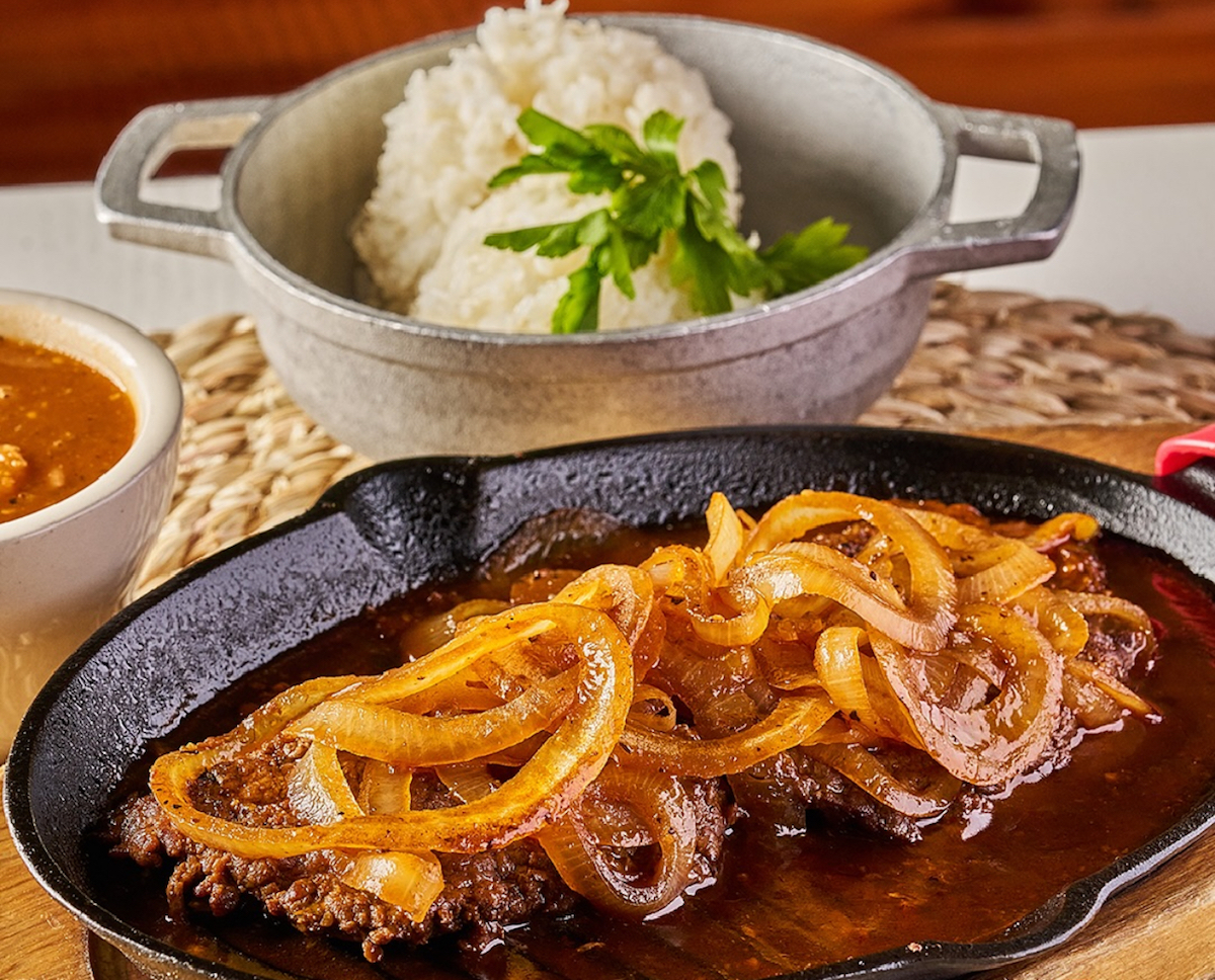 Steak and onions with white rice at Doña Maria. | Photo by Doña Maria