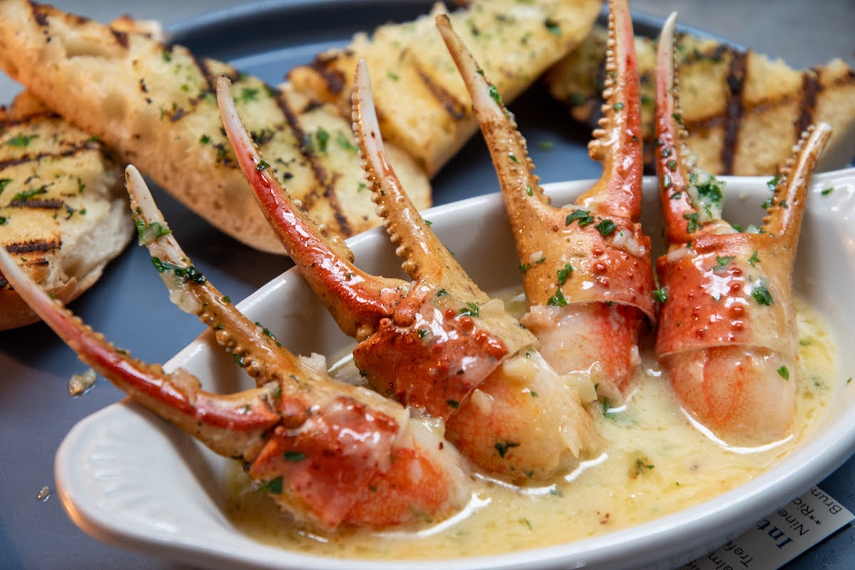 Buttery crab claws with toasted bread at Seabreeze. | Photo by Seabreeze