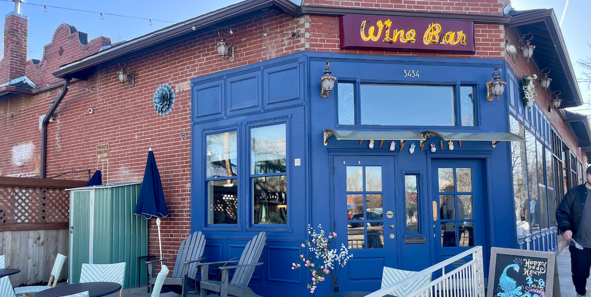 blue facade of red brick building