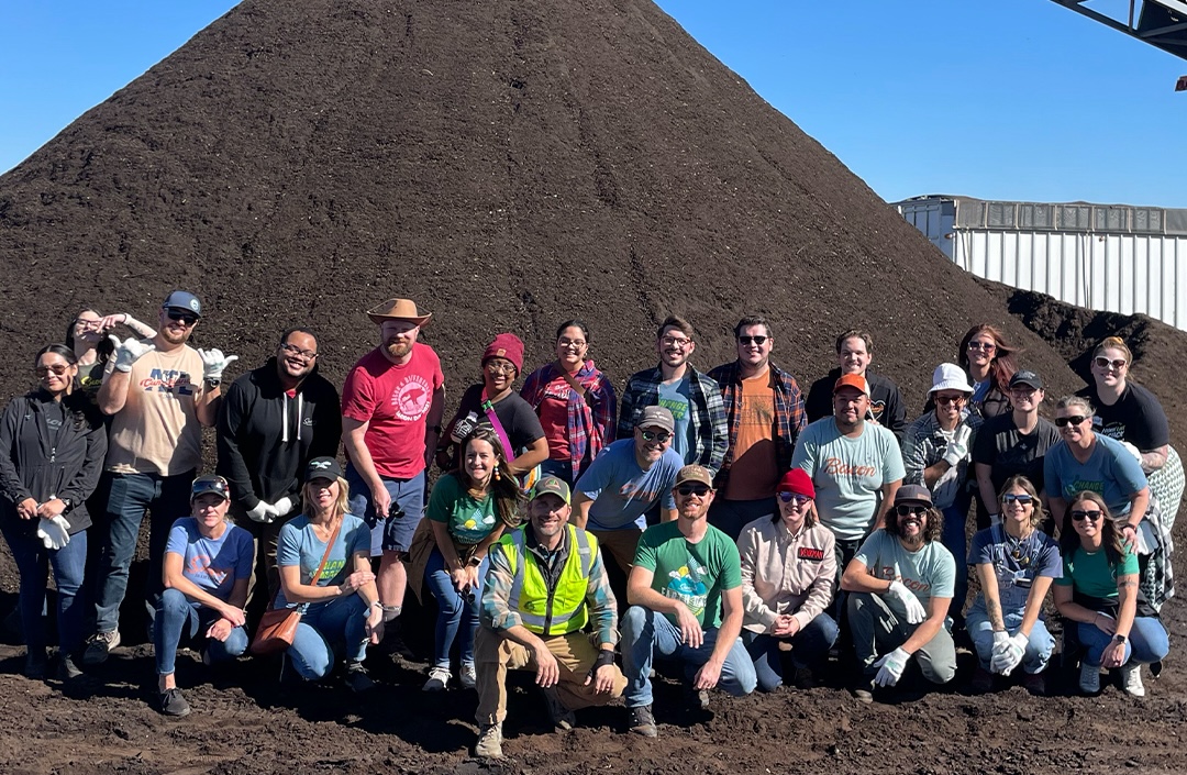 A group of Snoozers (as employees are called) on a company composting trip. | Photo by Snooze an A.M. Eatery