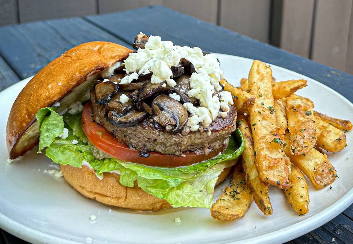 Electricity-from-a-Tesla-coil-at-the-Boston-Museum-of-Science - DiningOut A beef burger topped with mushrooms and feta cheese at Southern Yankee Crafthouse. | Photo by Southern Yankee Crafthouse