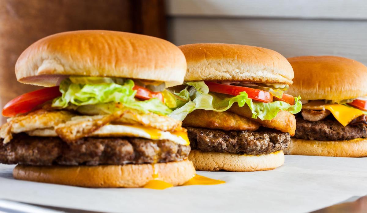 The-flower-garden-at-the-Isabella-Stewart-Gardner-Museum - DiningOut Southwell's burgers with toppings like bacon, egg, and onion rings. | Photo by Southwell's