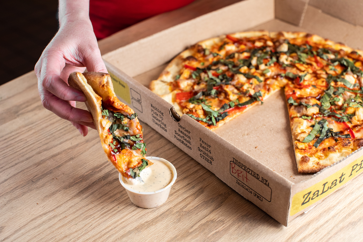 - DiningOut Zalat's signature sirancha sauce for dipping. | Photo by Zalat Pizza