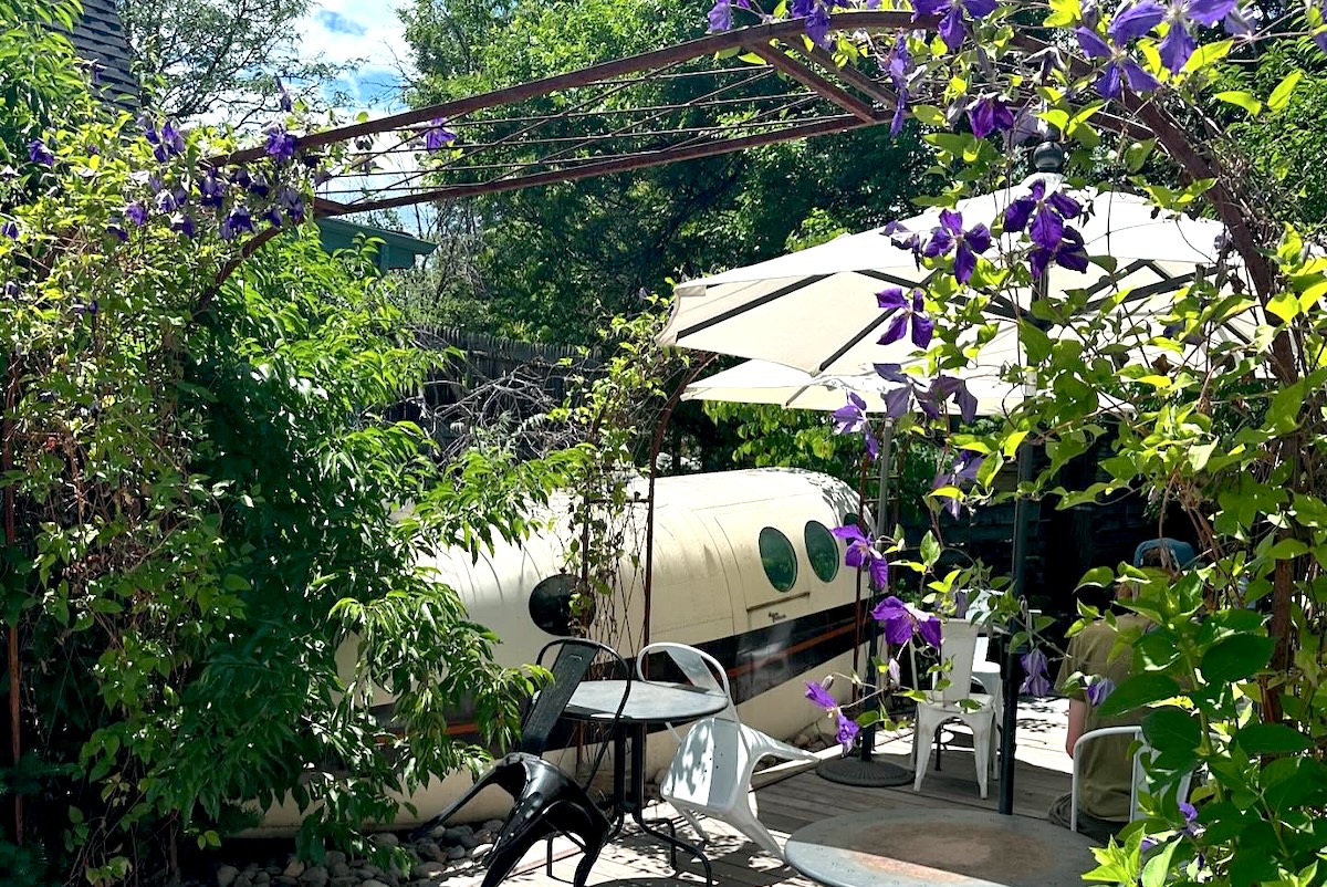 Coffee and plants? Yes please, this patio in Boulder has it all. | Photo by Steam Espresso Bar