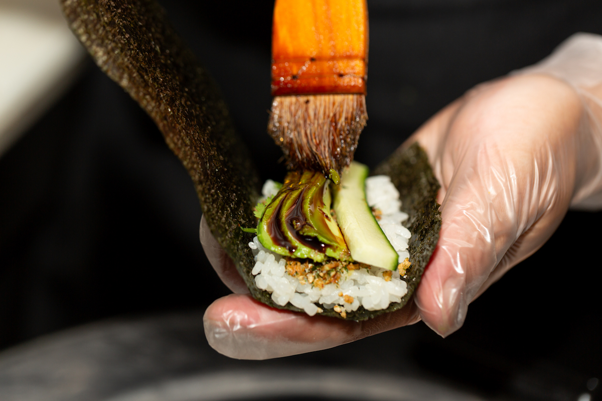 A hand roll getting finishing touches at Handies Douzo. | Photo by StudioRivera