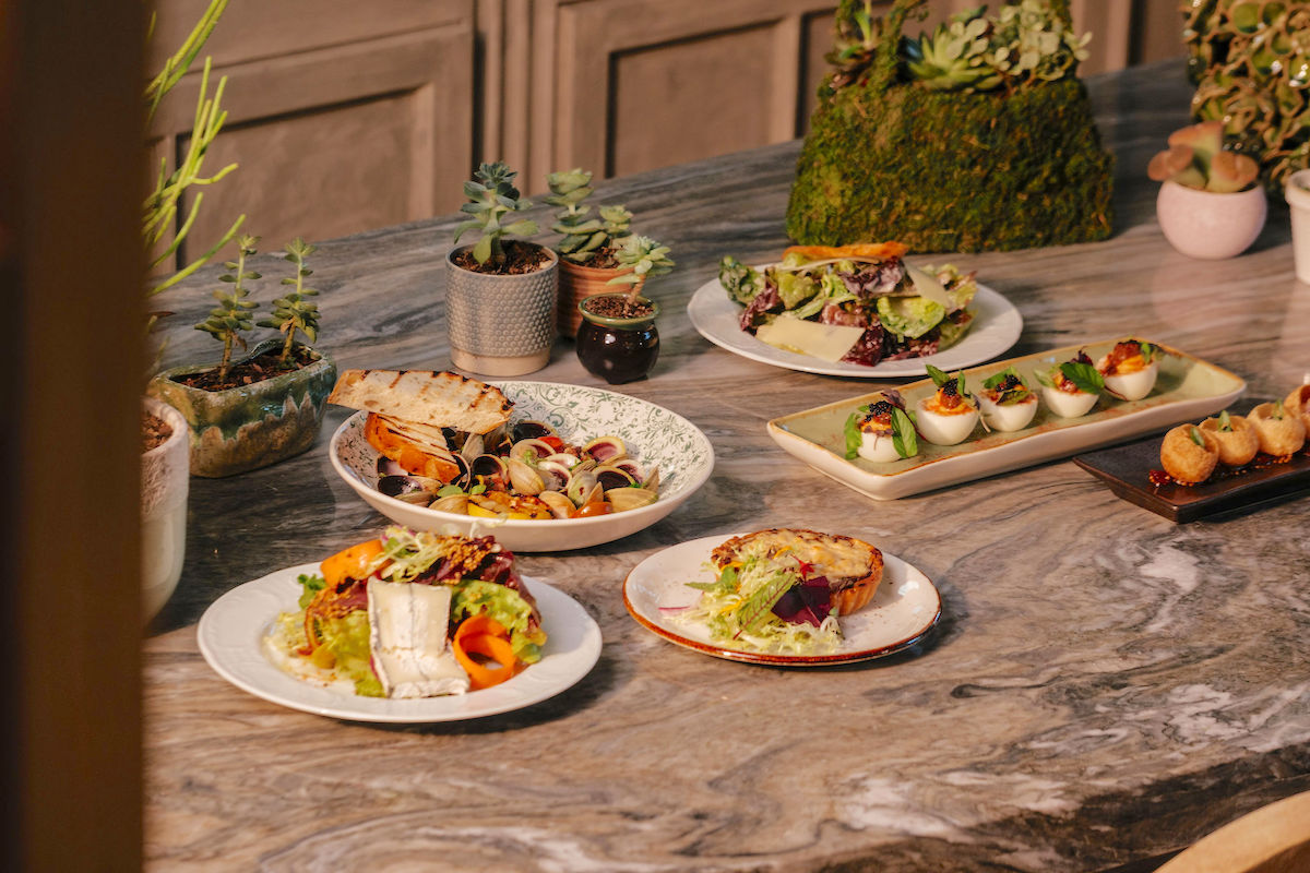 - DiningOut A spread of dishes at Succulent. | Photo by Quit Nguyen