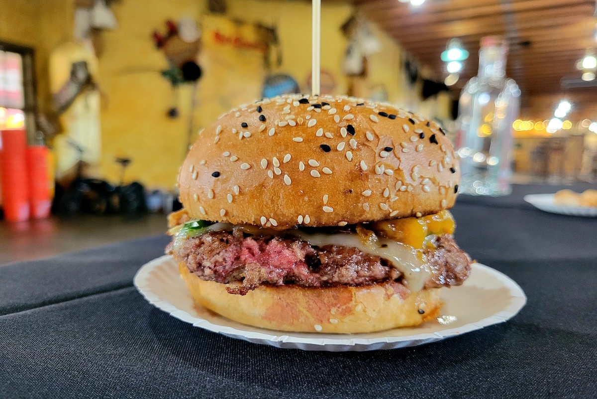 The peach burger from Tap & Burger during Burger Balooza. | Photo by Linnea Covington