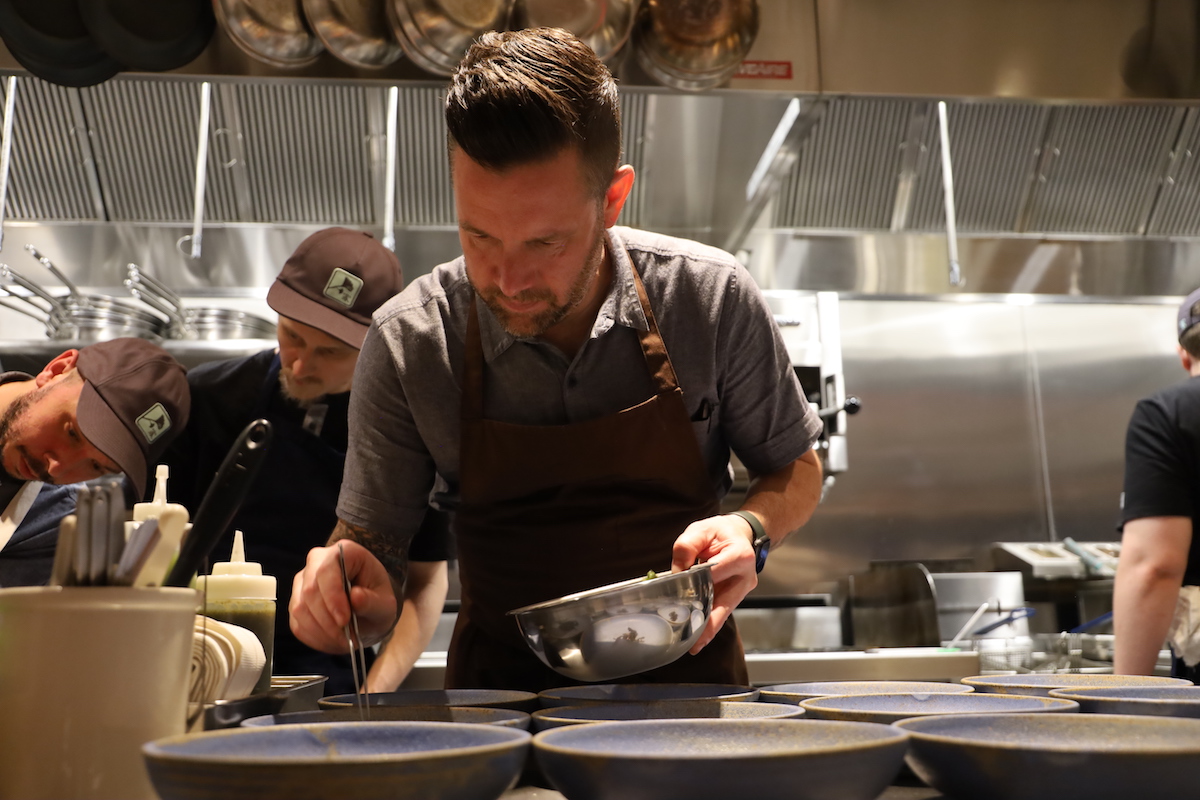 Chef Shaun King works in the kitchen at Uchiko Houston. | Photo by Hai Hospitality