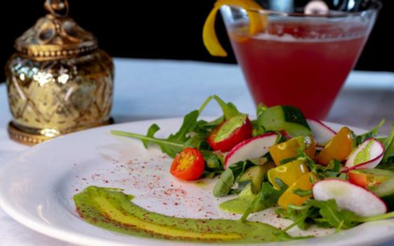 Arugula, watermelon radish, cherry tomatoes, English cucumber, green onion, radish, crispy pitas and pomegranate molasses