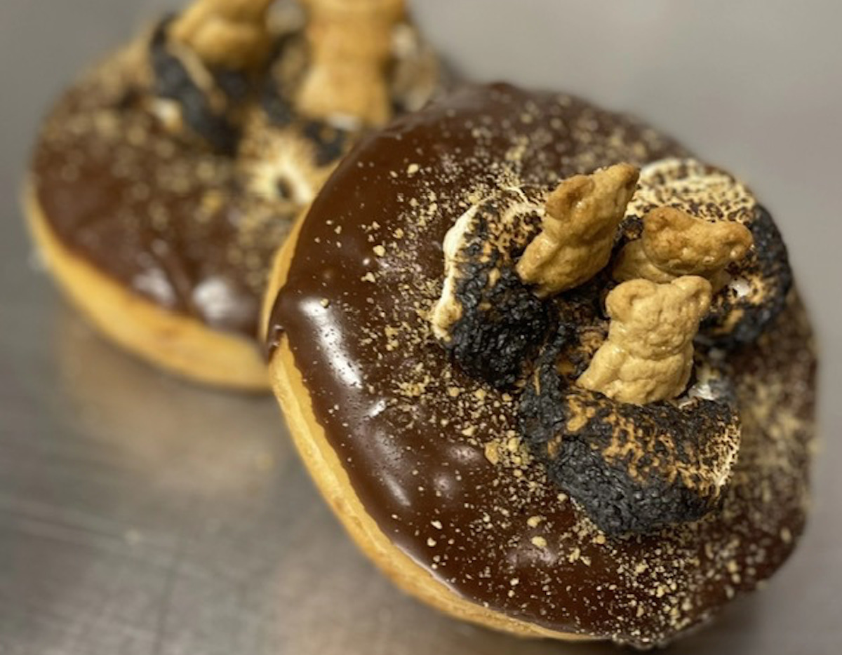 Chocolate iced doughnuts topped with Teddy Grahams at Urban Donut. | Photo by Urban Donut