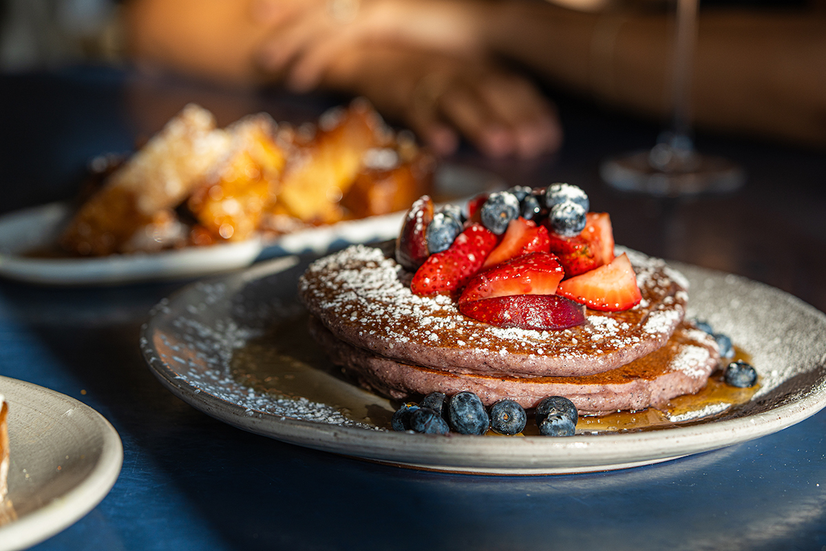 Pancakes topped with berries at Milo. | Photo by Milo