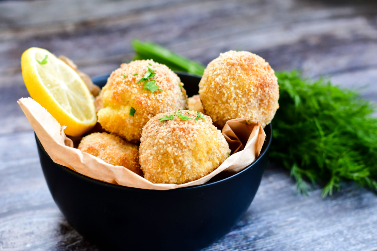 - DiningOut Arancini. Traditional Italian rice and parmesan balls stuffed with fresh mozzarella