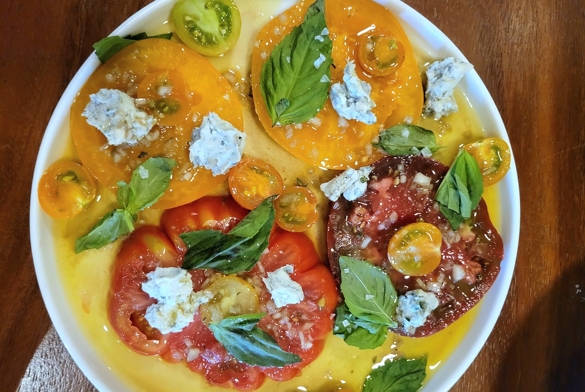 The perfect heirloom tomato salad at Brasserie Brixton. | Photo by Linnea Covington