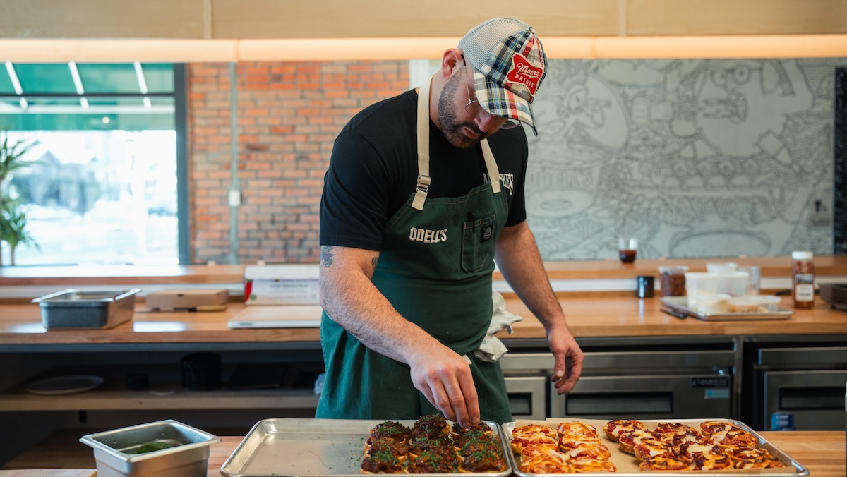 Chef Miles Odell making pizza bagels, a newer addition to the menu. | Photo by Jeff Fierberg