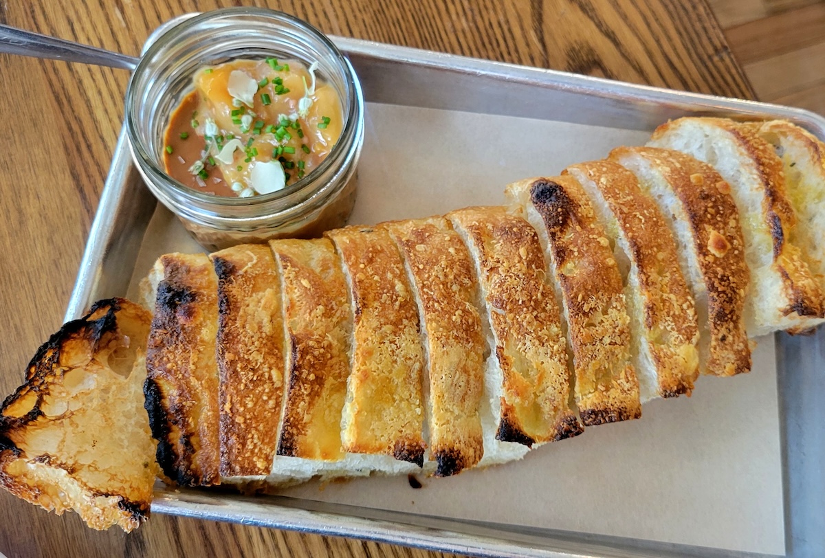The chicken liver mousse is on happy hour special. | Photo by Linnea Covington