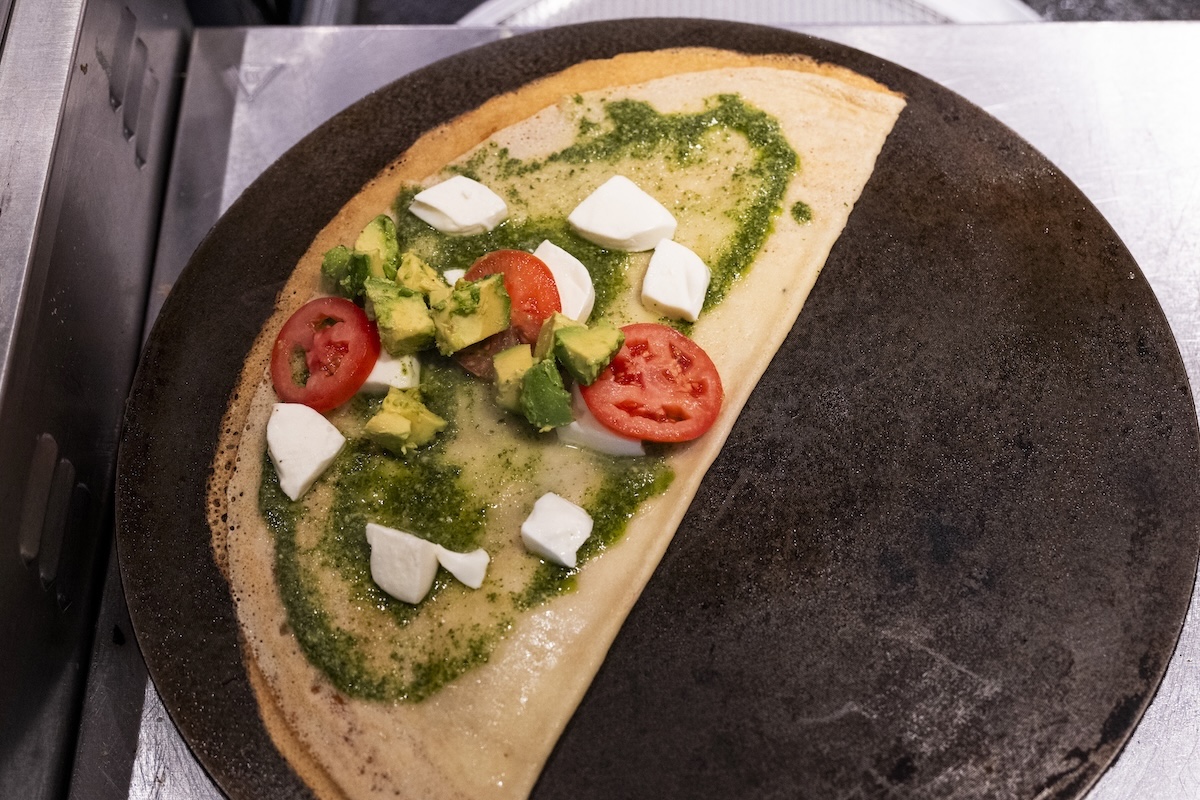 A savory crepe before the triangle fold. | Photo by Kelsey Brunner