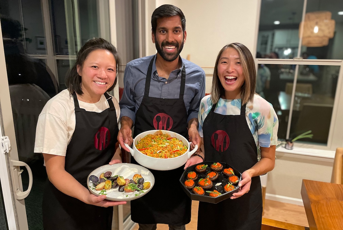 Happy students learning to cook. | Photo by Denver Cooking Classes