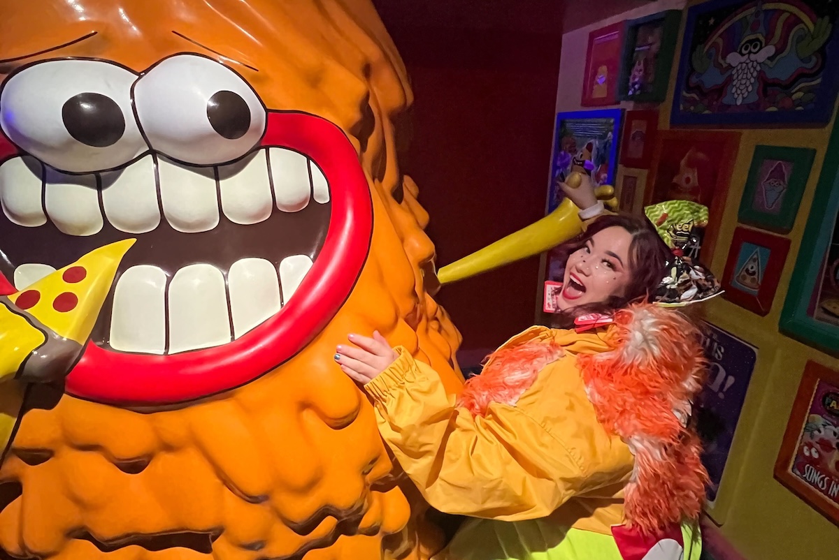 Doja making friends with Hungey in Convergence Station's Pizza Pals Playzone. | Photo by Meow Wolf