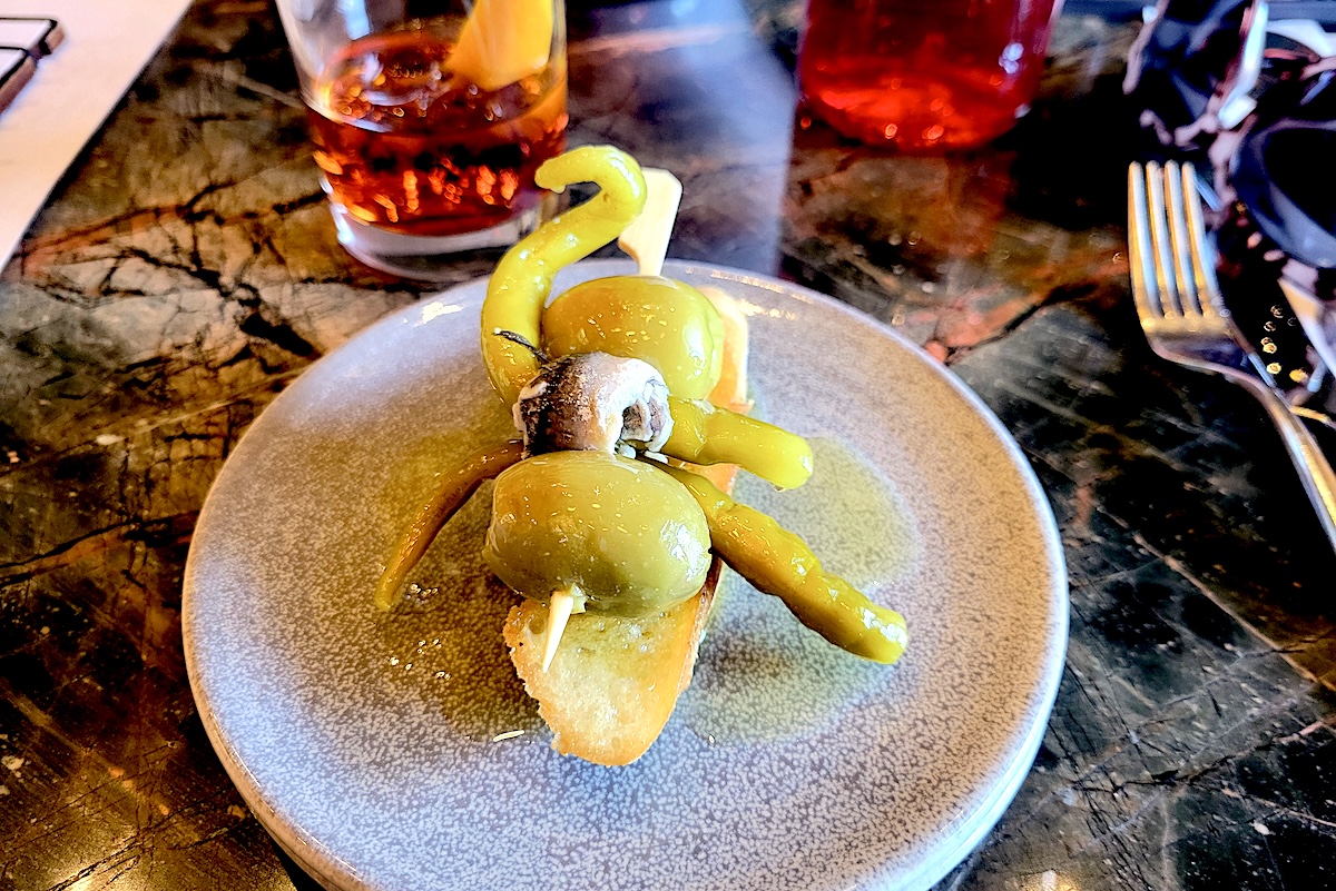 Try the Gilda off the Ultreia happy hour menu. | Photo by Linnea Covington