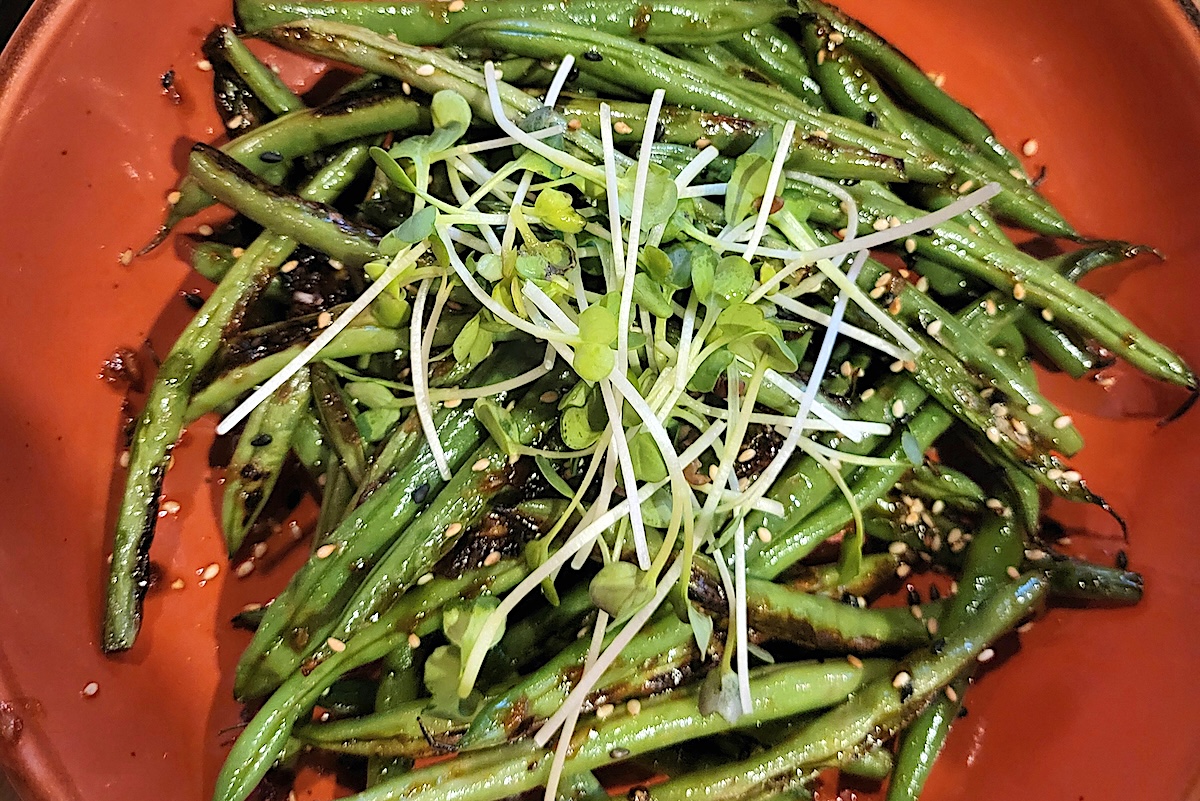 Honey laced green beans are one of the large sides at Bao Brewhouse's Tea Room. | Photo by Linnea Covington