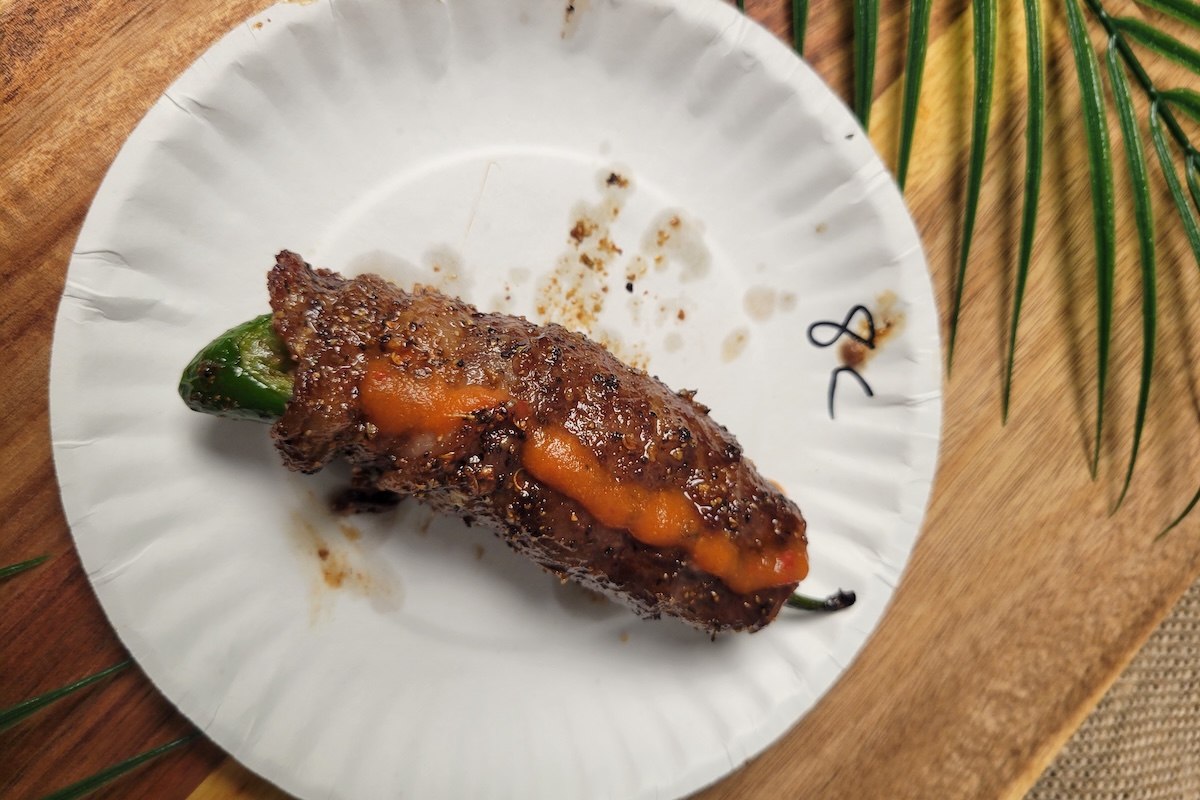 Jalapeño stuffed with crab and wrapped in wagyu by Harry's at the Magnolia Hotel. | Photo by Linnea Covington