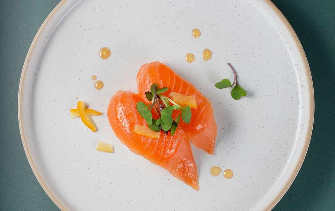 This Japanese chain is known for its high-quality salmon. | Photo courtesy of Kura Rotating Sushi Bar