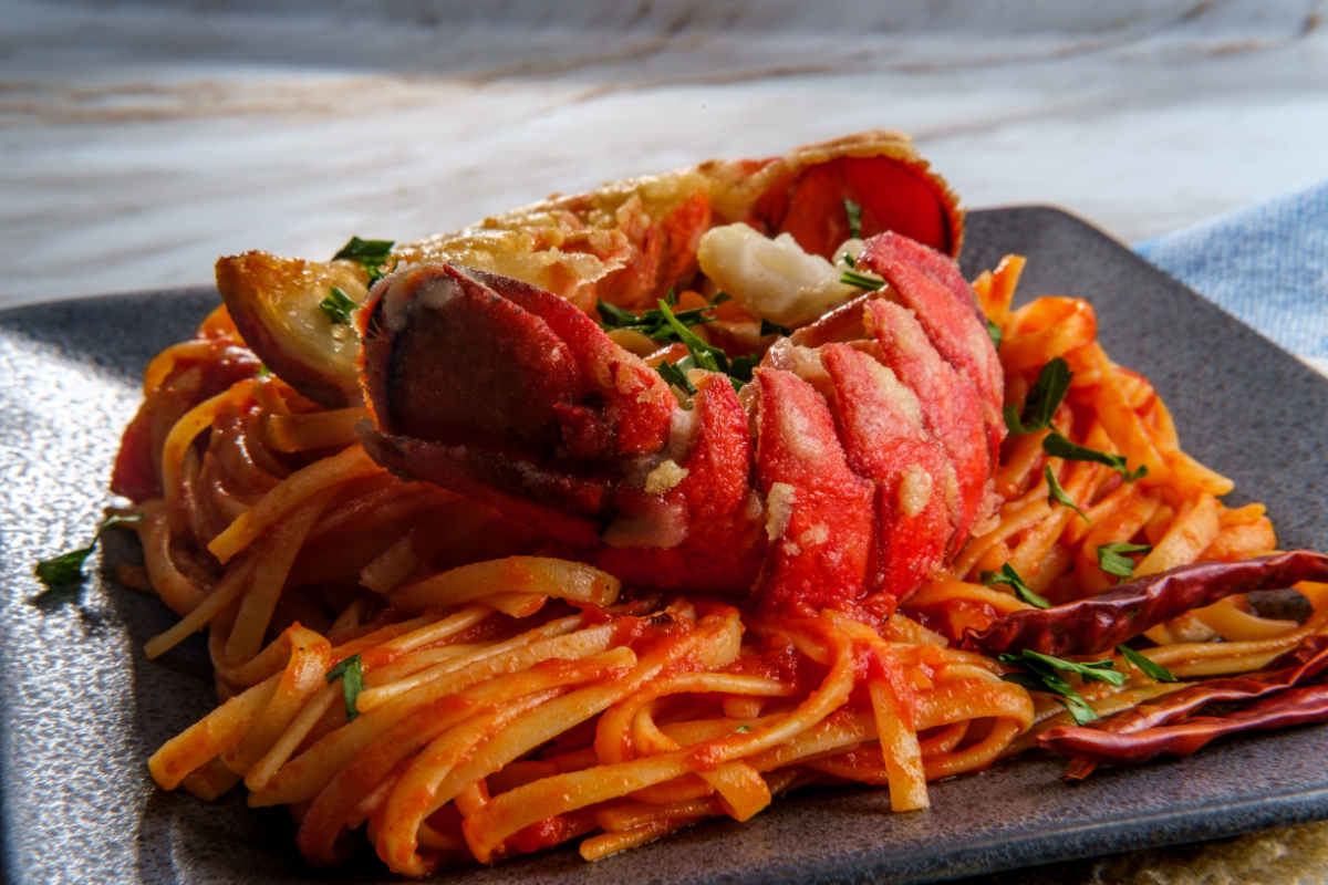 - DiningOut Pan fried sliced Italian lobster tail fra diavolo linguine