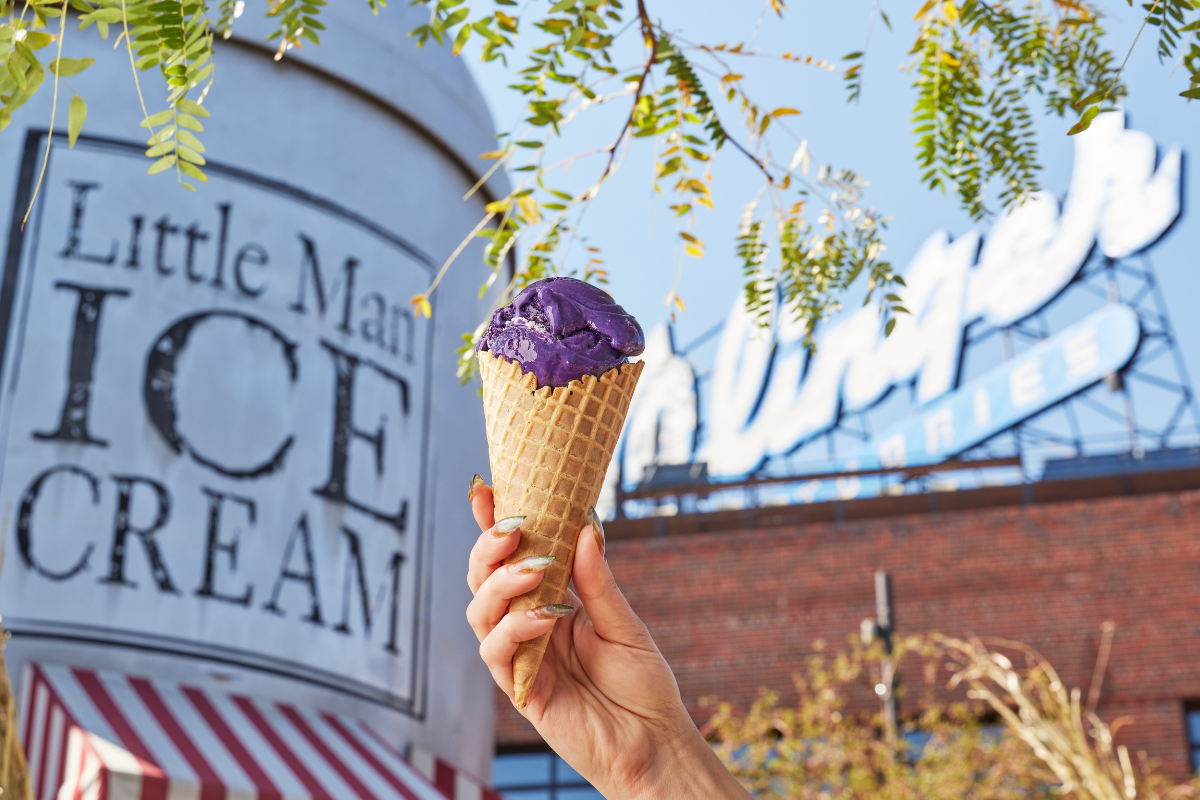Miami Restaurant’s K Cocktail Sparks Buzz with Hermès Birkin Presentation - DiningOut Global Little Man Ice Cream Denver giant milk can with hand holding purple ice cream cone at popular Highland neighborhood shop.